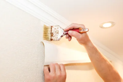Pose de papier peint au Frasnois — revêtements muraux et toiles de verre